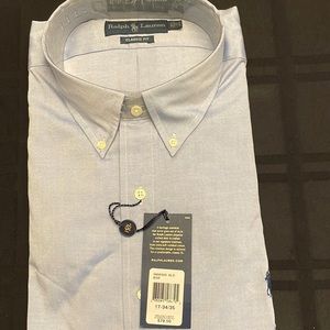Mens Ralph Lauren button down dress shirt in blue. Never worn. In original bag